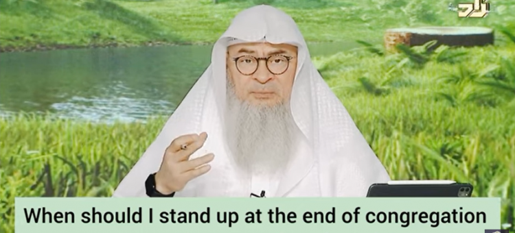 When do I stand up to continue my missed rakah at the end of prayer in congregation?