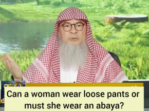 Can a woman wear loose pants & clothes or must she wear an Abaya?