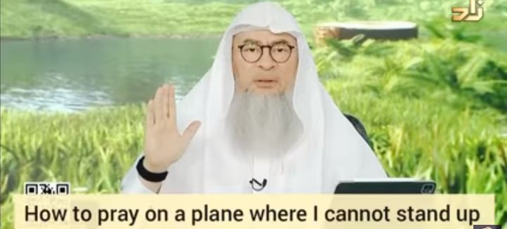 How to pray on a plane where I cannot stand up or face the qiblah?