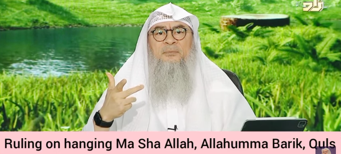 Ruling on hanging Ma sha Allah, Allahumma barik, Qul Surahs or any dua