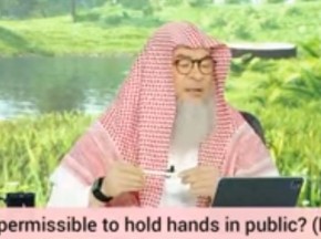 Muslim couple showing love to each other & holding hands in public (PDA)