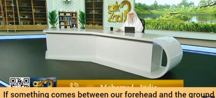 If hair, scarf, cap..comes in between forehead & ground in sujood, is prayer invalid